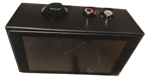 PajoNiiiR BL-A1800 standalone unit showing its 4.3-inch touch display, with the rear USB media port and RCA outputs visible along the top edge.